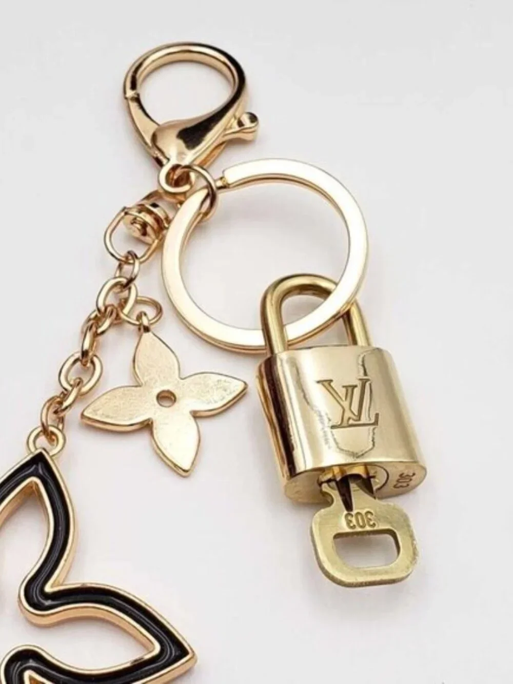 Authentic Louis Vuitton Gold Lock & Key 🔐 with unbranded Clover Bagcharm
